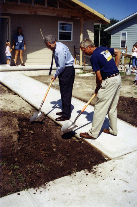 Senator Hagel and Ken Mumm, Habitat for Humanity president, at the construction site for a new home in Kearney, Nebraska., UNO Libraries' Archives &amp; Special Collections